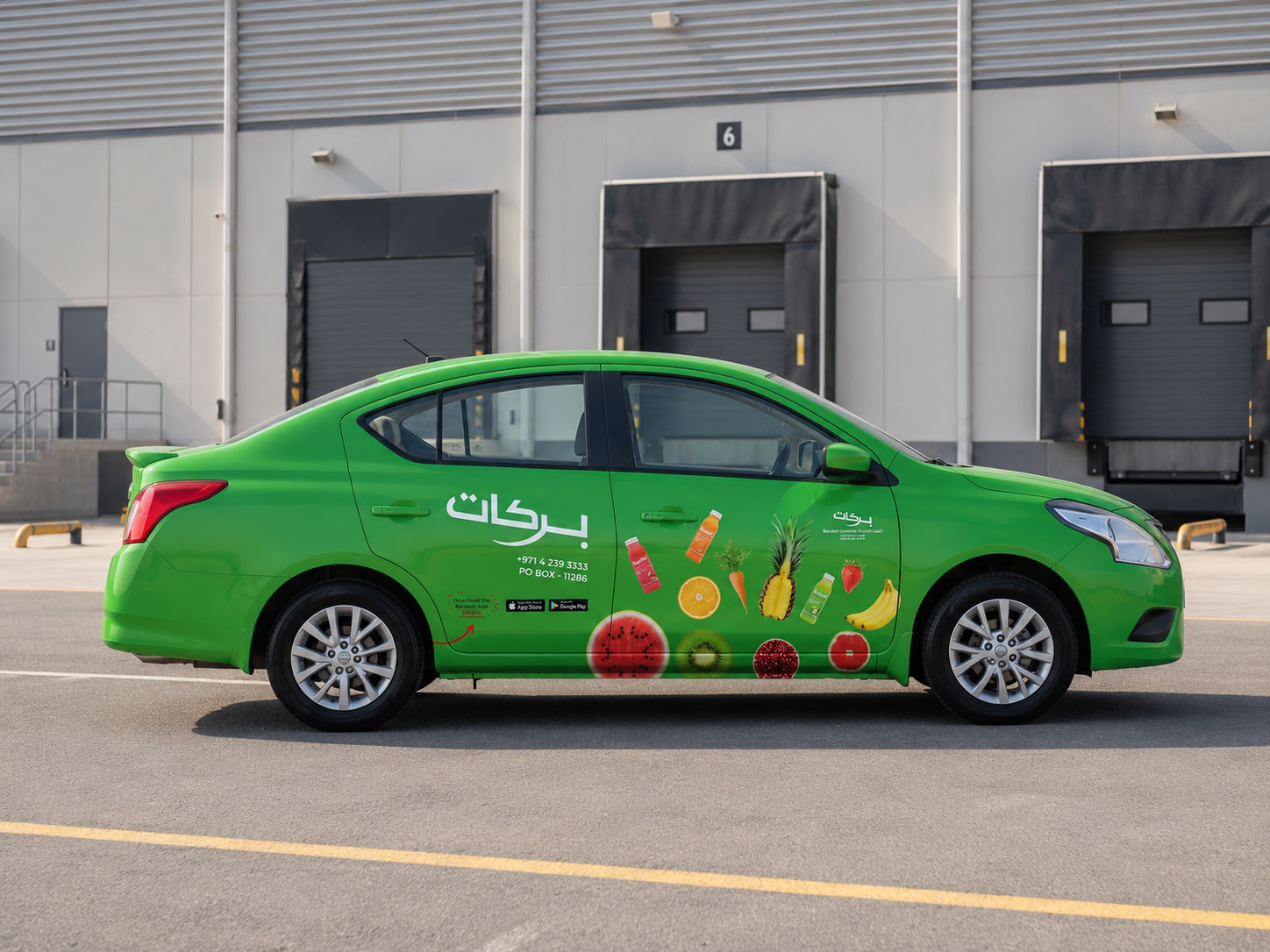 Custom car branding in Dubai with advertising graphics on a corporate sedan